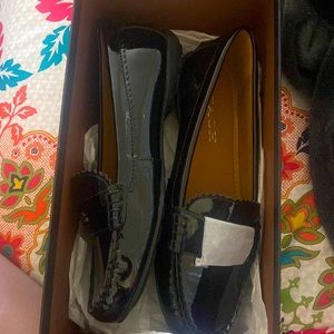 I am selling Coach flat dress shoes, they are size 6 and it is all black